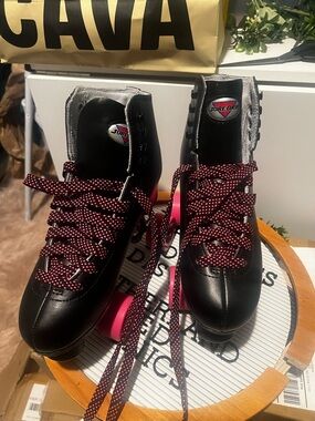 Black Sure Grip Roller Skates with Pink Accents